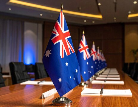 A high-resolution overhead view of a diverse creative team collaborating on a colorful mood board in a bright modern office workspace