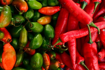 Vibrant Close Up Display of Fresh Red and Green Chili Peppers