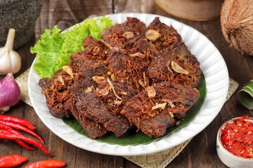 Empal daging sapi. Empal beef is a typical Indonesian food made from processed beef and cooked with spices.