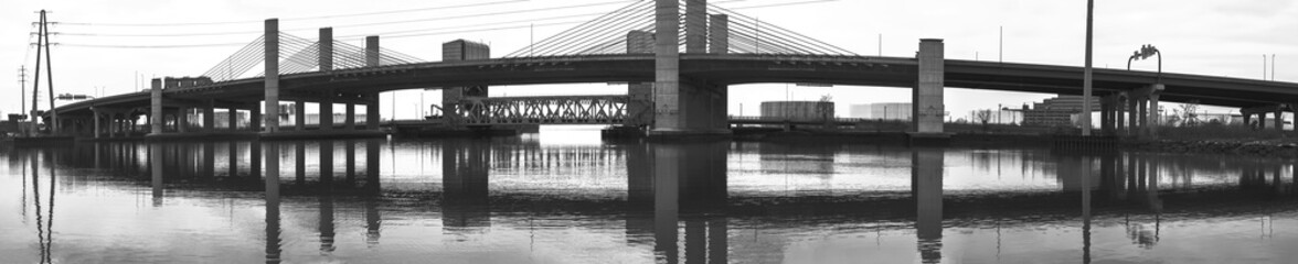 Tomlinson Suspension Bridge on Interstate 95 across the Quinnipiac River in New Haven Harbor, Connecticut, United States, black and white retro-style photo