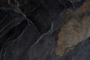 Dark grey black slate background or texture. black stone