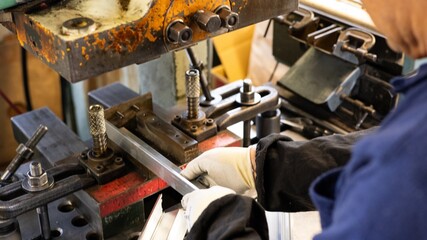 Precision aluminum frame positioning on industrial press machine