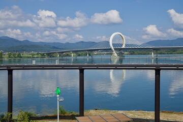 Ring‑arch bridge over lake