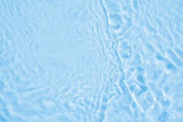 Abstract transparent water shadow surface texture natural ripple on blue background