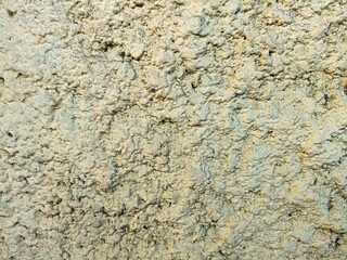 Obraz premium stone wall texture. Texture of natural stone for wall. Closeup. isolated macro texture coastal cliffs in sunlight. White wall stone texture