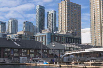 Naklejka premium view northwest to Queens Harbour and Radisson Blu incl condominium complexes and other offices from Harbourfront Centre, Toronto