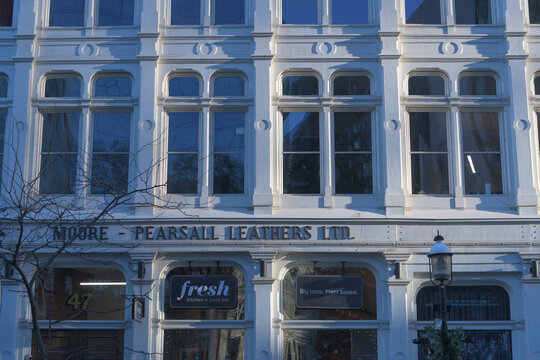 exterior building facade and sign of Fresh Kitchen + Juice Bar located at 47 Front St E, Toronto