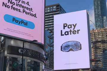 Fototapeta premium digital billboard facing Sankofa Square featuring PayPal advertising, Toronto
