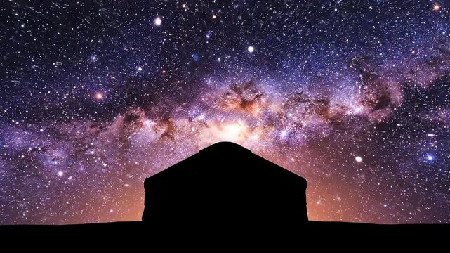 Seamlessly looping abstract motion graphic featuring the dark silhouette of a yurt structure against a backdrop of the intensely moving Milky Way galaxy Seamlessly looping abstract, architecture