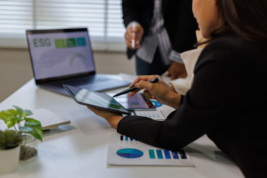 Business meeting. talk ESG strategies risk management workshop, SDGs report, global warming, green finance investment eco friendly and net zero waste in boardroom training building.
 - Powered by Adobe