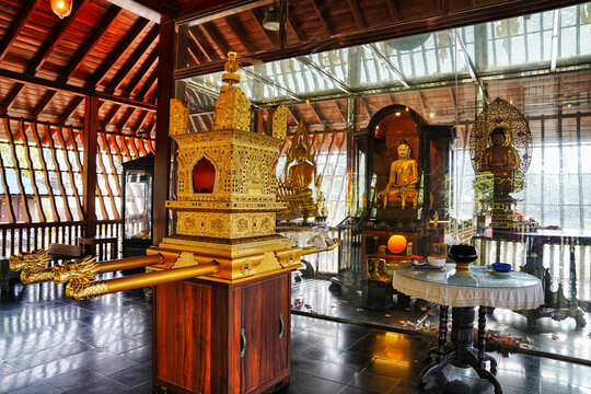 Gilded and jewel encrusted buddhist reliquary casket or Dhatu Cetiya with Buddha idols inside the Seema Malaka Buddhist temple on Beira Lake,built by architect Geoffrey Bawa,1976 in Colombo,Sri Lanka