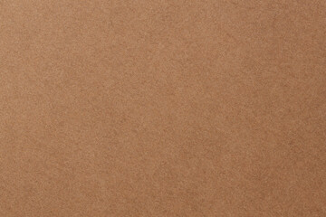 Craft Paper Surface with Grainy Texture and Earth Color Macro View