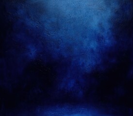 Obraz premium deep blue textured abstract background with moody atmospheric light and painterly canvas texture