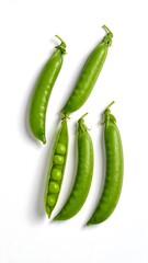 Fresh, bright green pea pods and split pea on white background, studio shot