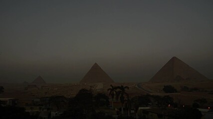 Cairo,Egypt - December 6, 2025: View of great pyramid complex at dawn in Egypt
