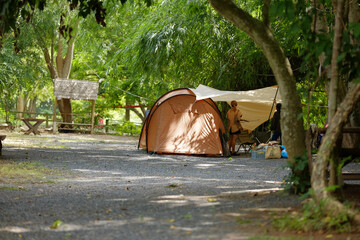 Man in Red Cap Walking in Green Park, Back View, Summer Leisure