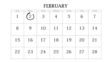 Marking the 2 February date on the calendar with a circle