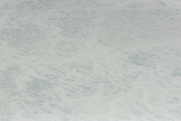 Top down aerial view of icy desert of Antarctica.