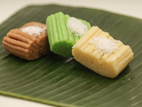 Gethuk Lindri, an Indonesian traditional snack made from cassava and shredded coconut, on banana leaf