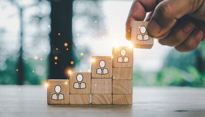 Building staircase with wooden blocks representing growth and teamwork, symbolizing progress and collaboration in professional environment
