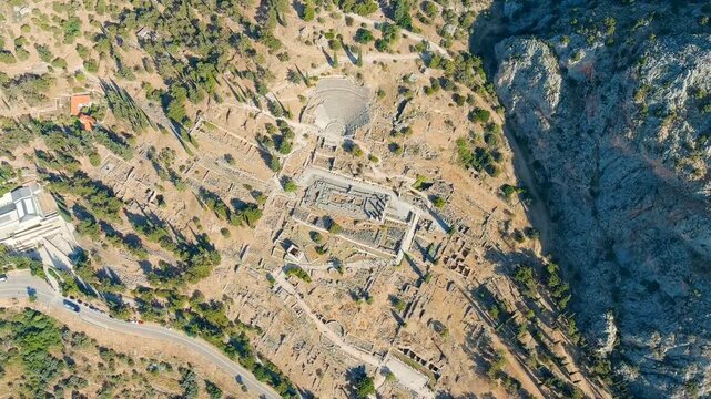 Delphi, Greece. Ruins of the ancient city of Delphi. Sunny weather in the morning, Summer. Drone footage