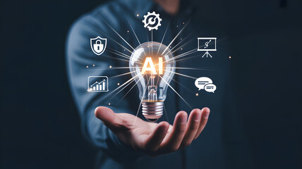 Hand holding glowing light bulb with technology icons symbolizing innovation and intelligent digital solutions

