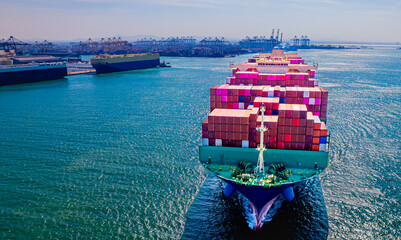 container ship, fully loaded with goods, sails out to sea, delivering products to various locations