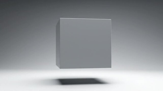 Silver cube floating in air with shadow on the floor