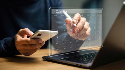 Person using a smartphone and laptop with a digital calendar overlay