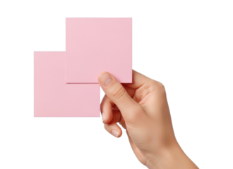 Woman's hand holding two blank pink sticky notes isolated on white background