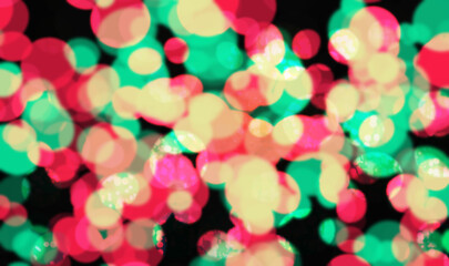 Dynamic Abstract Bokeh Background with Vibrant Magenta and Teal Overlapping Light Circles on a Dark Backdrop
