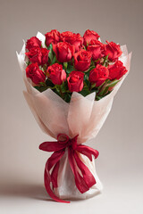 A large bouquet of red roses