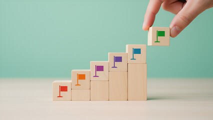 Colorful Growth Blocks: Stacked Wooden Blocks with Bright Flag Icons for Teamwork and Strategy
