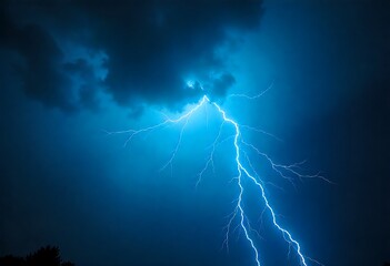Electric blue lightning rips through dark storm clouds at night, creating a dramatic atmospheric background showcasing power, energy, danger, and intense weather in a sky.
