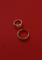 wedding ring on a red background