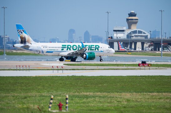 Frontier Airlines aircraft Airbus A320-251N taxiing to take off at the Dallas Fort Worth International Airport (DFW). Wellington the Black-Footed Ferret livery.