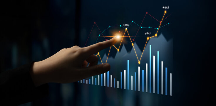 A hand reaches towards a digital data visualization, highlighting interactive graphs and charts in a modern financial setting, emphasizing data analysis and trends. Scalp - Powered by Adobe