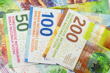 Swiss franc banknotes &ndash; colorful currency of Switzerland