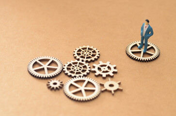 The Cog of Leadership: Businessman Overseeing Organizational Efficiency.