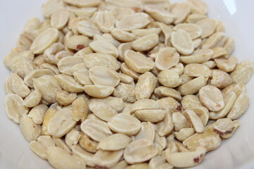 Raw peanuts arranged in a bowl ready for meal preparation or snack use during morning hours