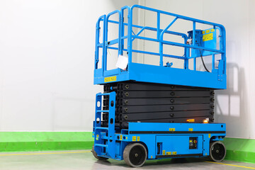 Scissor Lift Aerial Work Platform in Distribution Warehouse