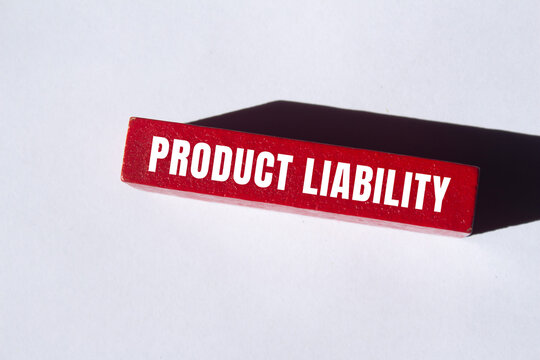 Product liability message written on wooden block background. Conceptual Product liability symbol. Copy space.