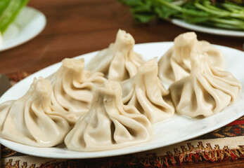 Khinkali is the national dish of Georgian cuisine.Tasty eating concept. Copy space