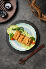 Delicious Fried Tofu on a Bed of Lettuce with Cherry Tomatoes and Dill.
