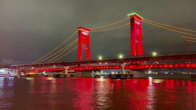 The view at night on the Ampera Bridge in Palembang, South Sumatra, Indonesia