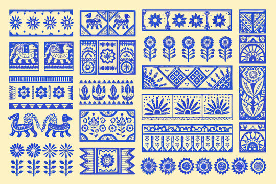 Collection of vintage blue and white polish paper cut folk art patterns