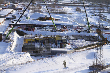 The first stage of building construction. Tying the reinforcement. Preparing for pouring concrete for the supports and walls. General view from above.	
