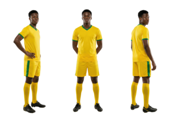 Young Black Male Soccer Player in Yellow and Green Uniform Product Shot