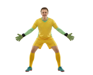 Male Soccer Goalkeeper in Yellow and Green Uniform Ready to Catch Ball