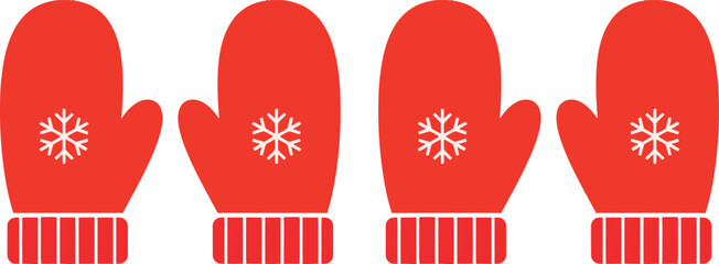 Four red winter mittens with white snowflakes